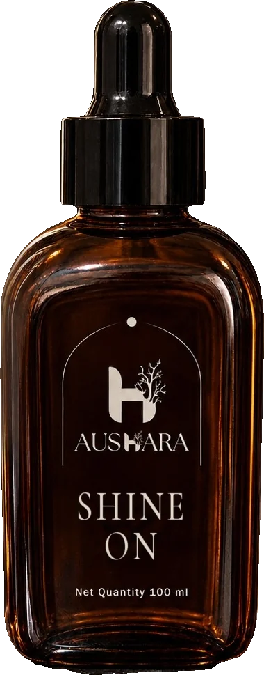 Shine On - For Hair hair oil in an amber dropper bottle