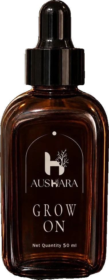 Grow On - For Hair hair oil in an amber dropper bottle